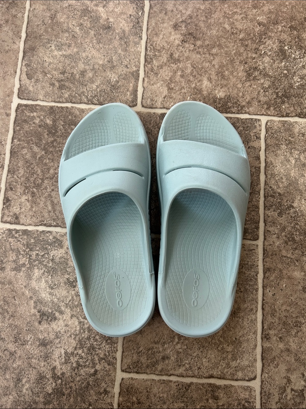 Oofos Slip-On Sandals in Pale Aqua